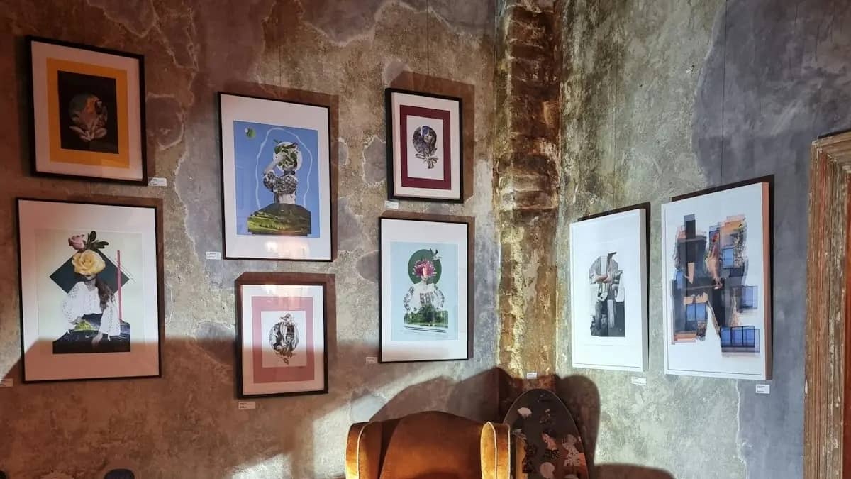 Cozy corner reading nook featuring an eclectic gallery wall wrapping smoothly around a ninety-degree wall corner above an armchair