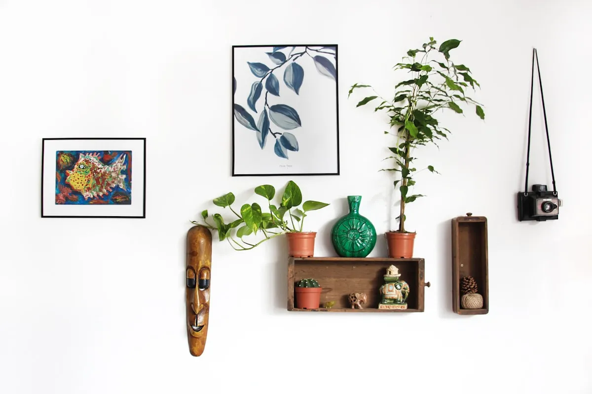 Bright apartment interior featuring lightweight framed artwork and floor-leaning decor without wall holes